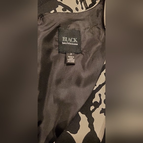 Elegant Black and White Midi Dress - Picture 11 of 11